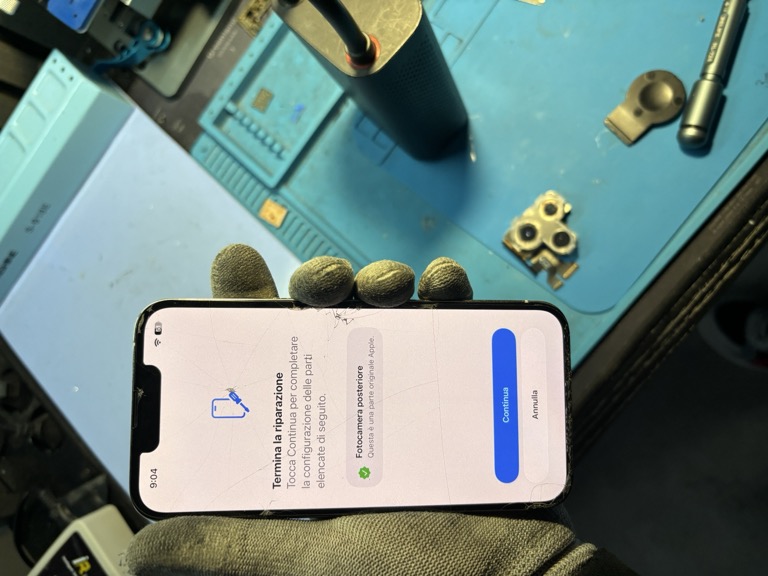 Schermata iOS - Termina la riparazione: Fotocamera posteriore - Questa e una parte originale Apple